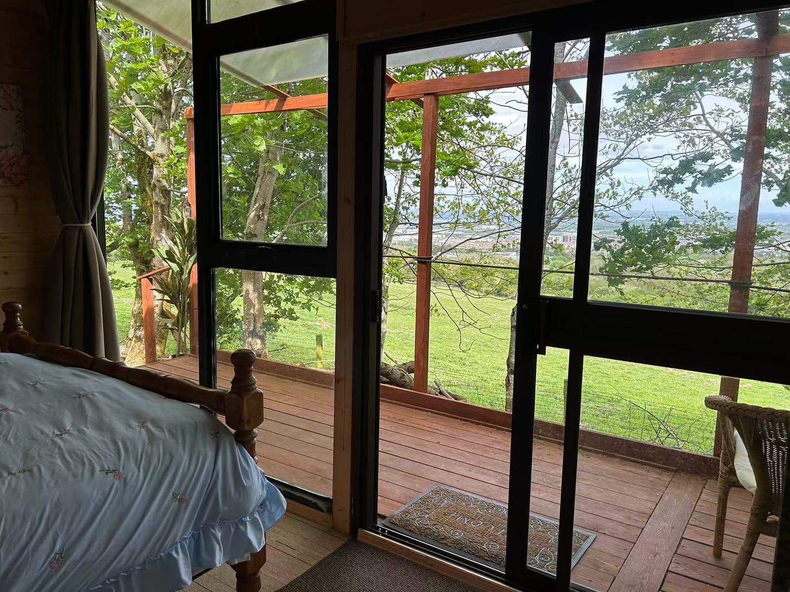 Countryside view through the Farm Cabin windows